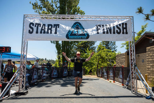 Can I Run an Ultra Marathon: Runner crossing the finish line of the san diego 100.